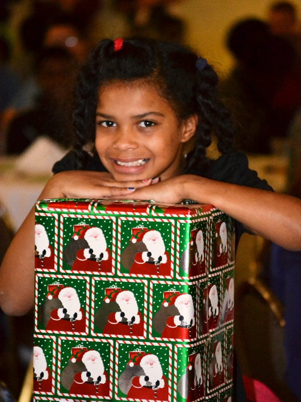 Eighty-two children from the Methodist Home for Children receive Christmas gifts and a holiday celebration in December with help from the chapter and surrounding community.